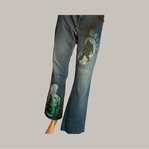 Upcycled, Bigfoot theme jeans that are distressed, bleached and painted.